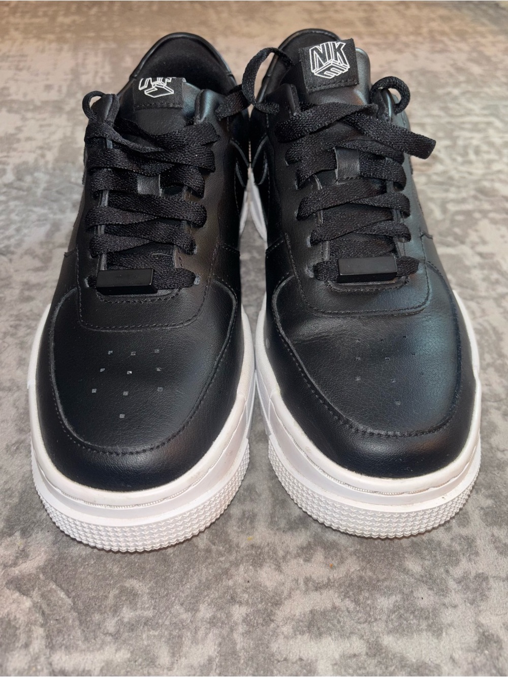 Nike Black Leather Low-Top Sneakers with White Soles